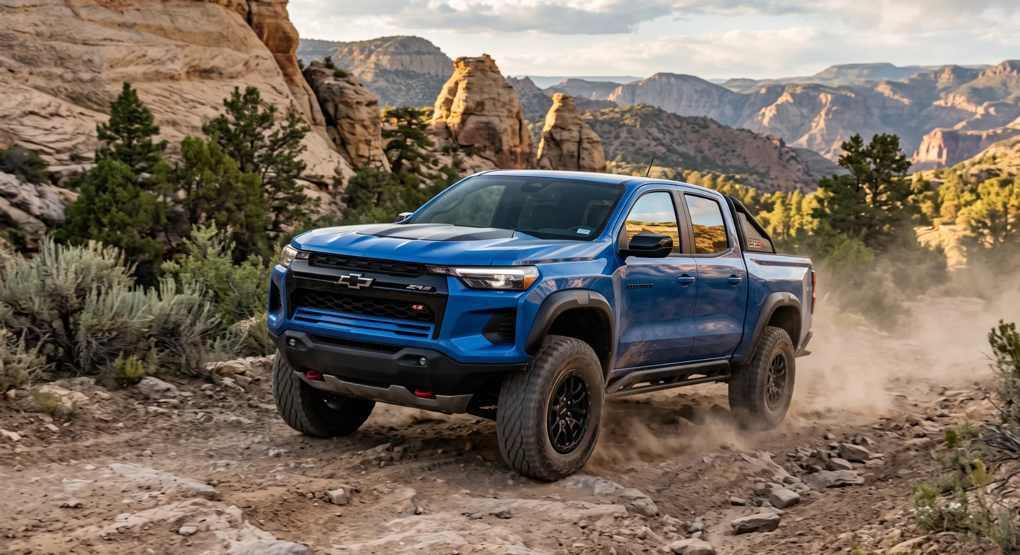 Chevrolet Colorado 2026 ZR2 en terreno todoterreno con suspensión Multimatic DSSV y neumáticos para lodo