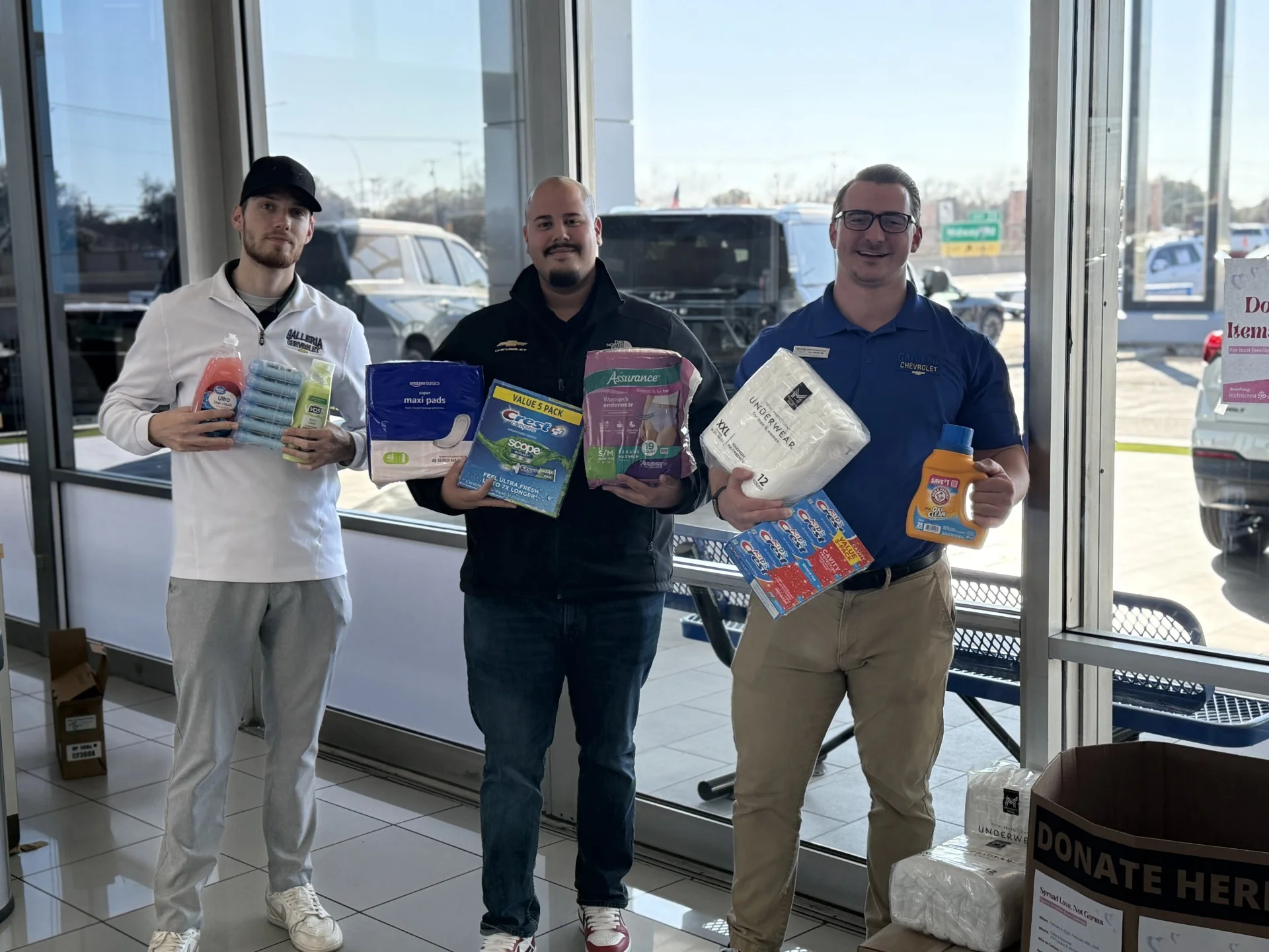 Galleria Chevrolet team with hygiene supplies collected for the Metrocrest Services hygiene drive