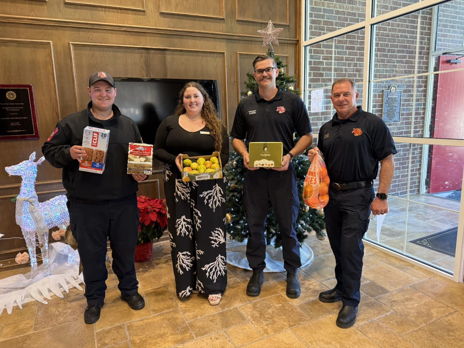 Holiday food and treat delivery from Galleria Chevrolet to the Addison Fire Department
