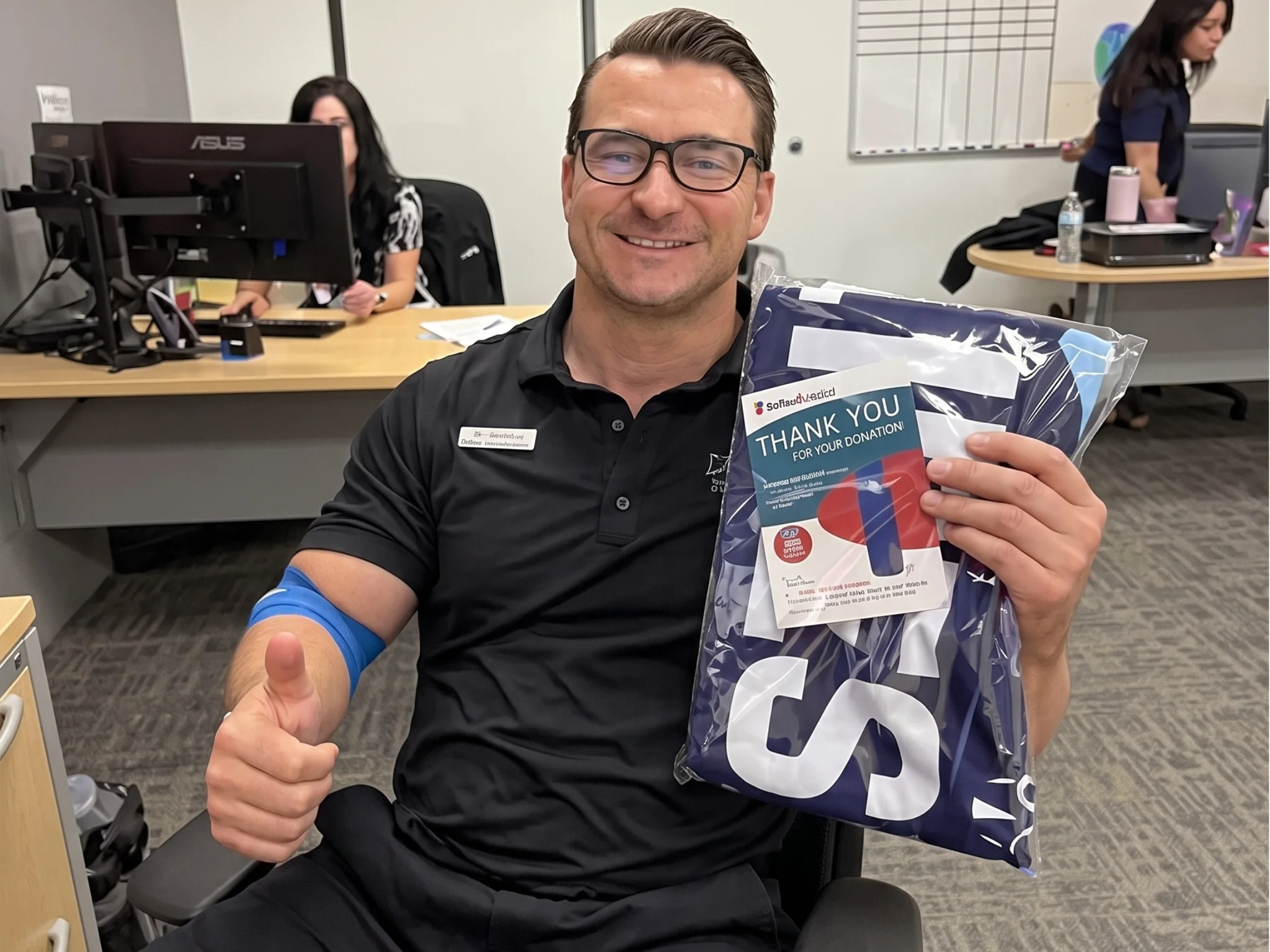 Carter BloodCare staff assisting a donor at Galleria Chevrolet