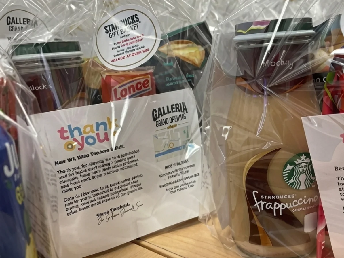 W.T. White High School teachers receiving Teacher Appreciation bags from Galleria Chevrolet