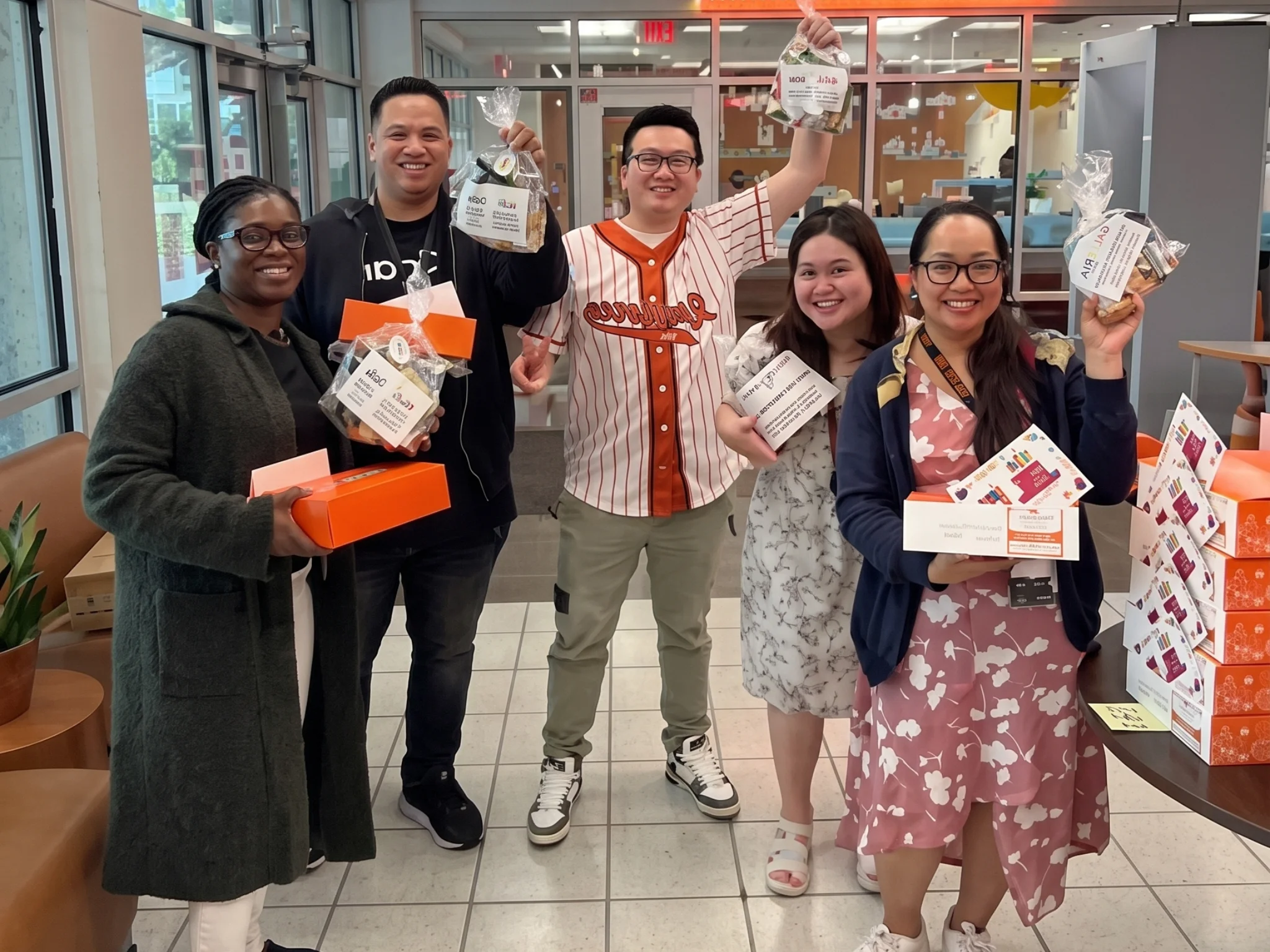 Galleria Chevrolet team delivering Teacher Appreciation bags to W.T. White High School