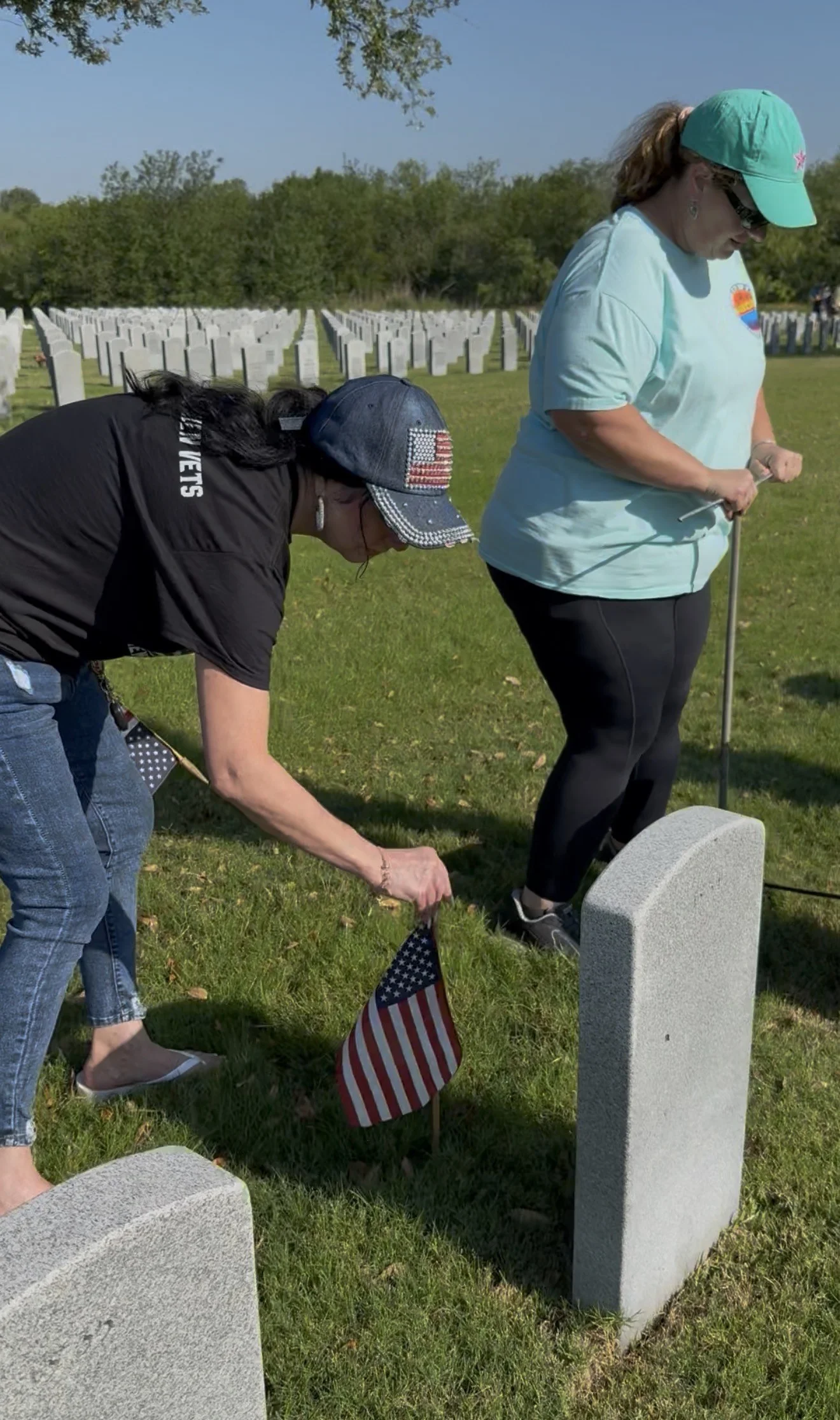 Memorial Day flag placement at DFW National Cemetery supported by Galleria Chevrolet