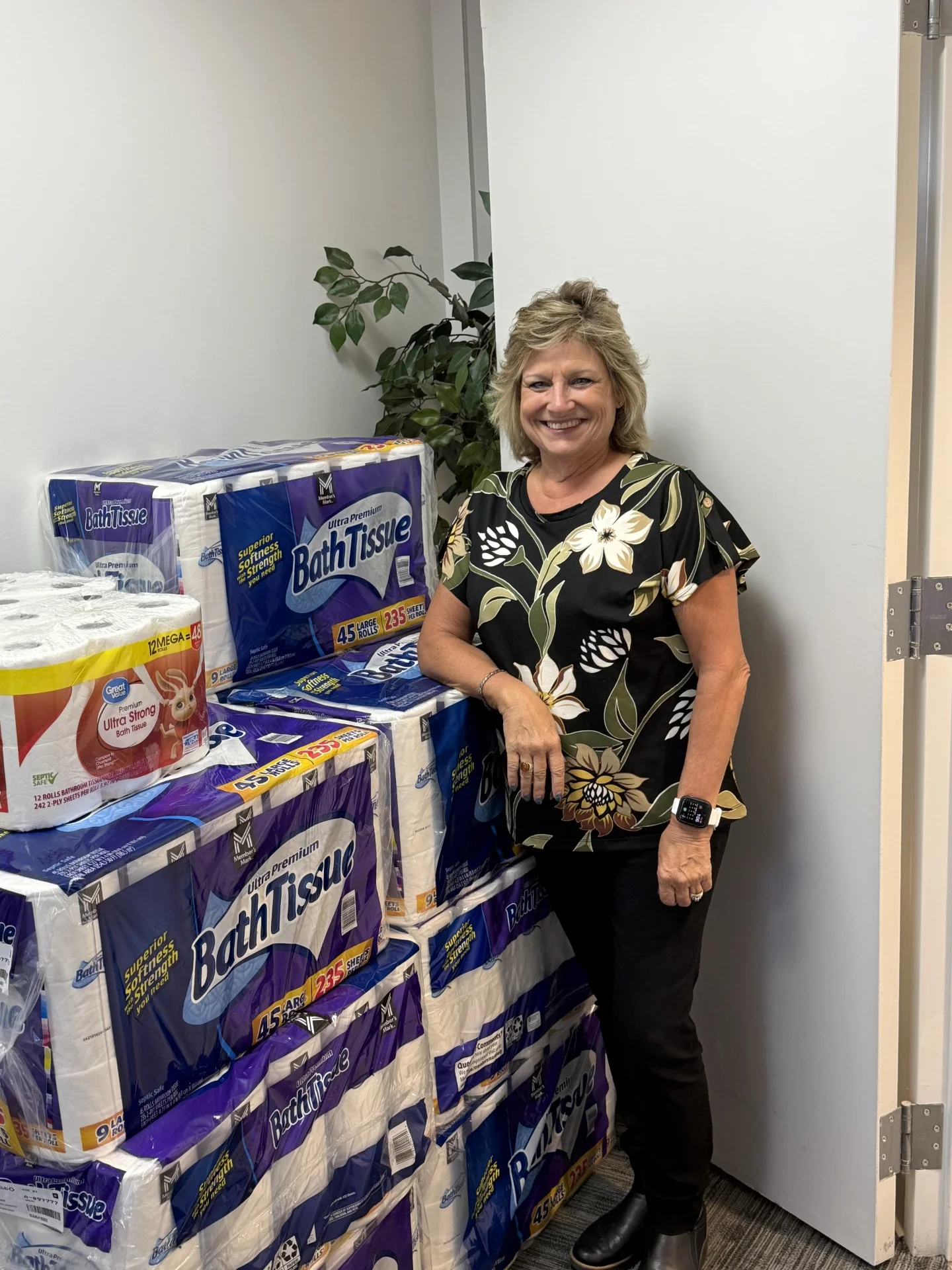 Paper goods collected for the Metrocrest Services toilet paper drive