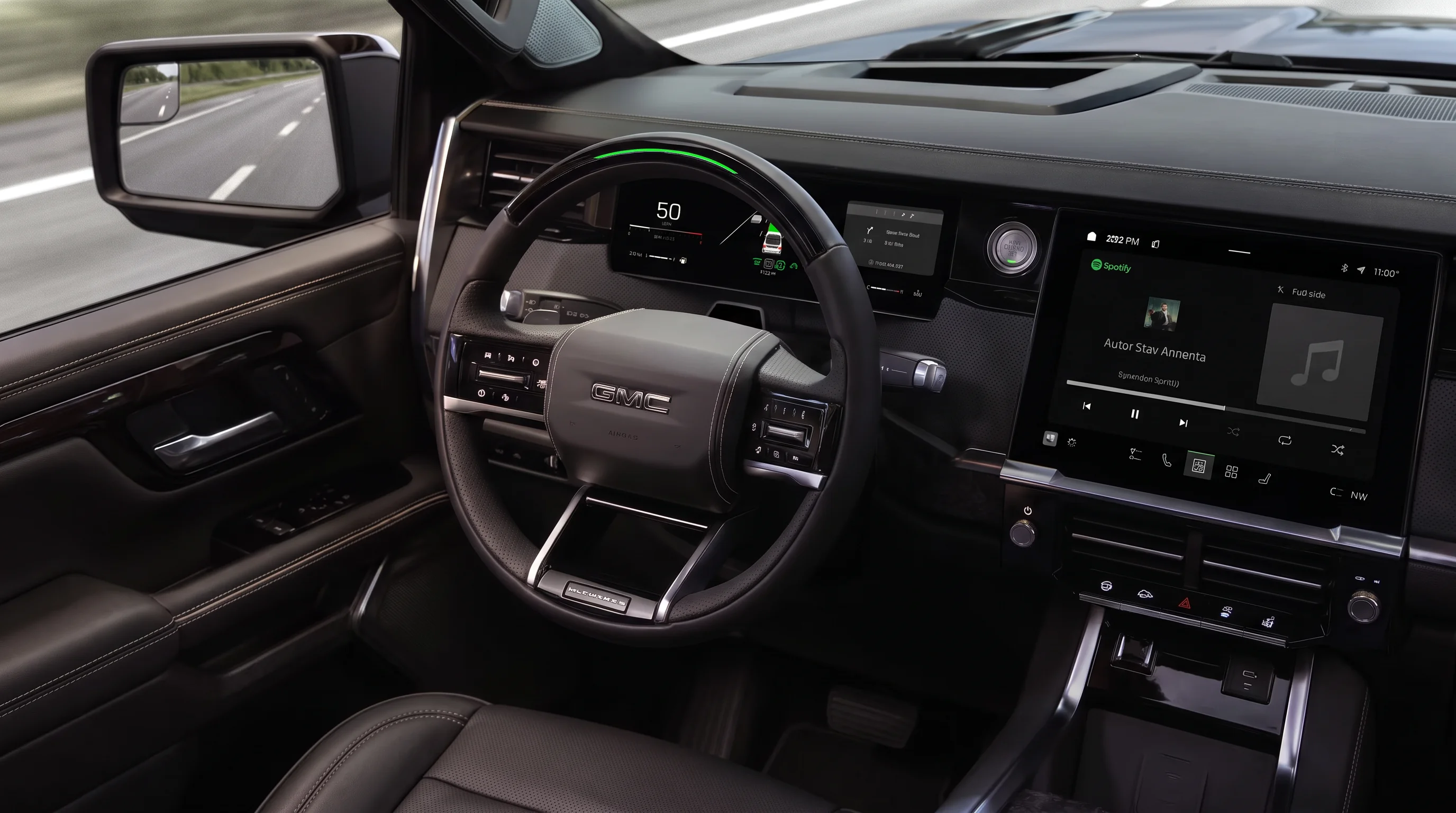 Interior of the 2027 GMC Sierra 1500 showing the steering wheel and driver-facing camera area