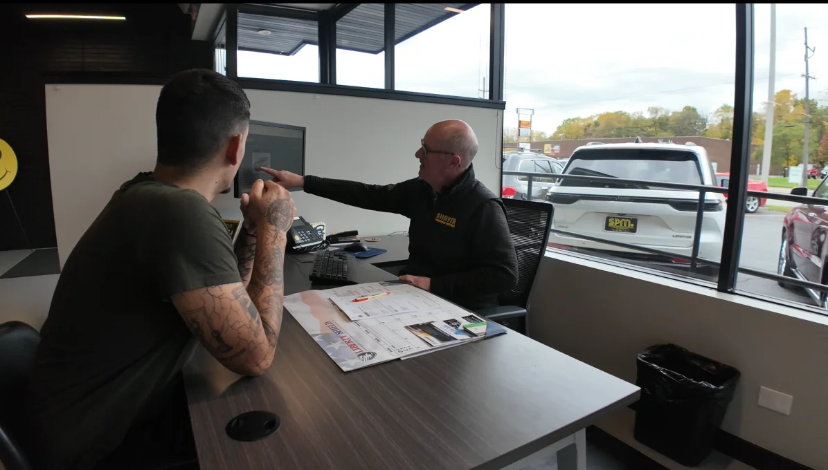 Shaver Preferred Motors finance team helping a customer through the bad credit auto loan approval process in Merrillville, Indiana