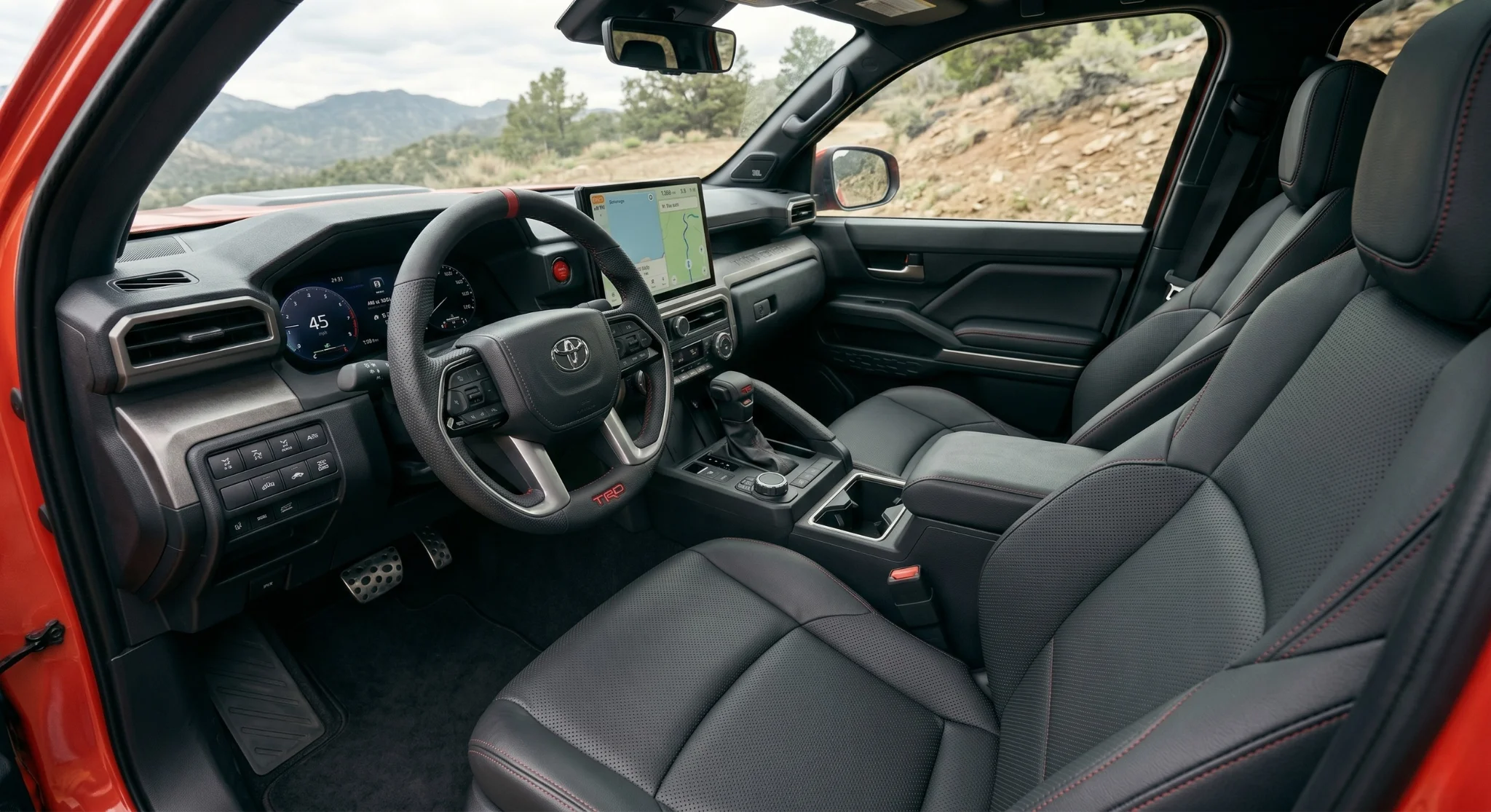 2026 Toyota Tacoma interior cabin with multimedia touchscreen and digital gauge cluster