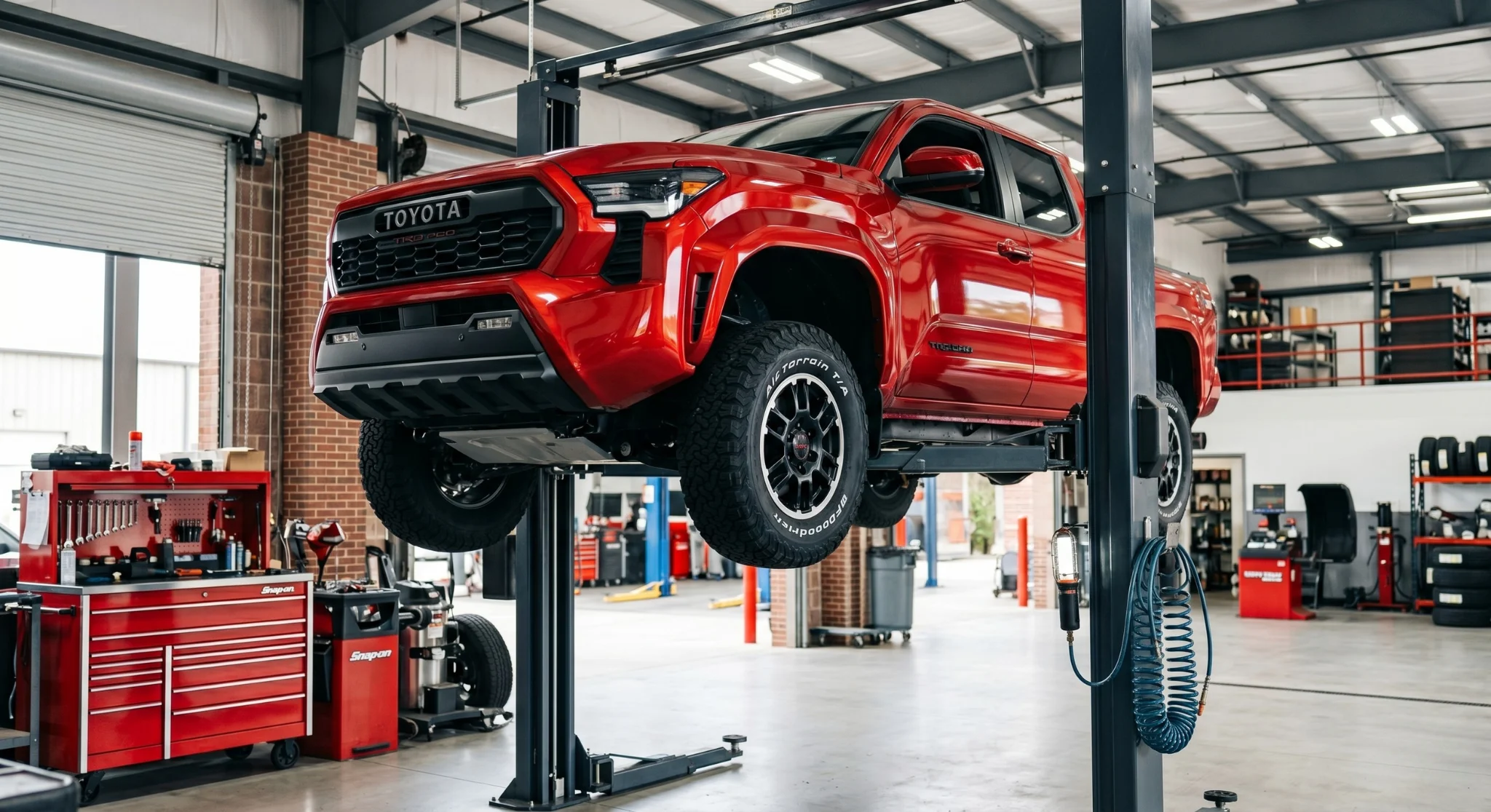 Toyota service technician performing maintenance at Toyota of Glendale service center