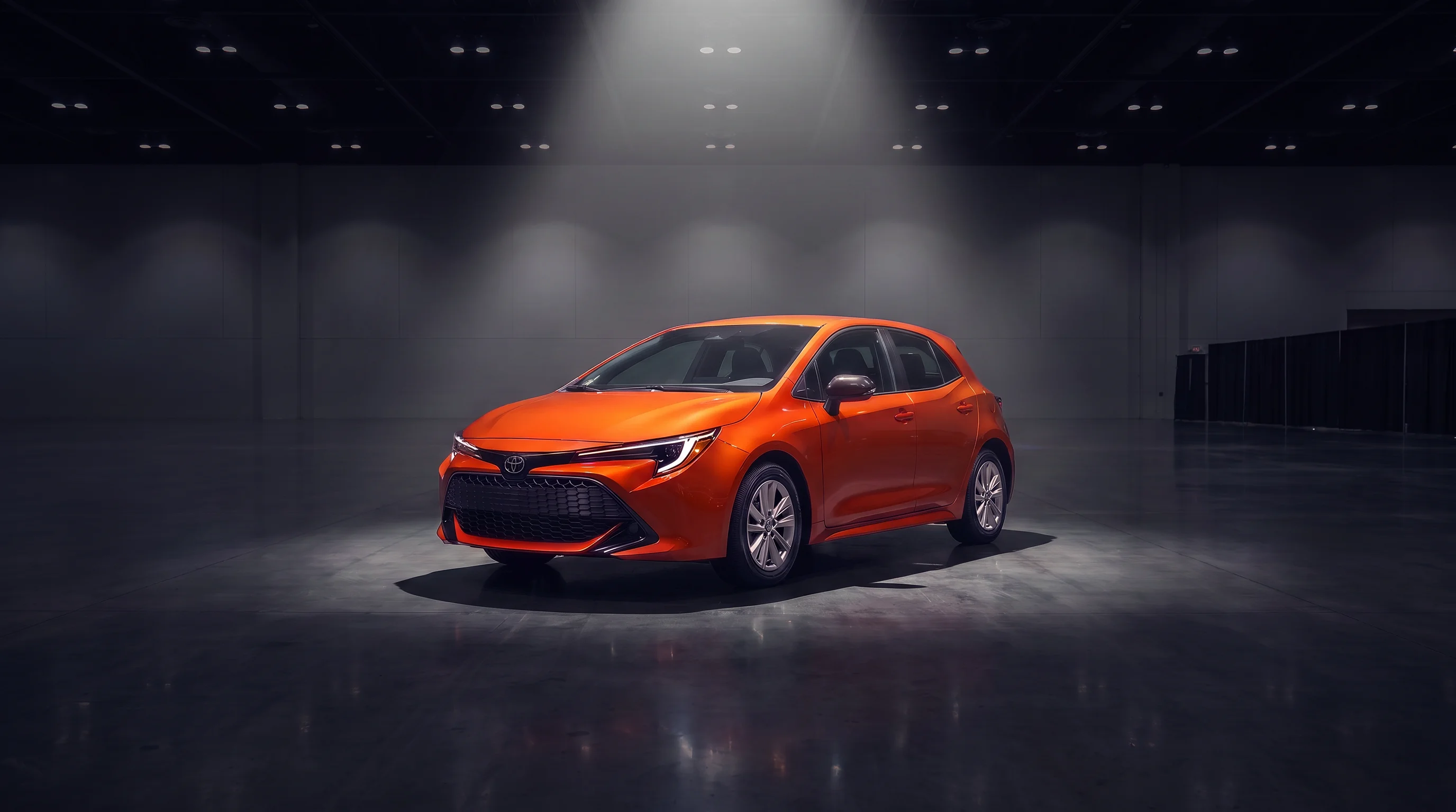2027 Toyota Corolla Hatchback in profile view showing its five-door body and alloy wheels