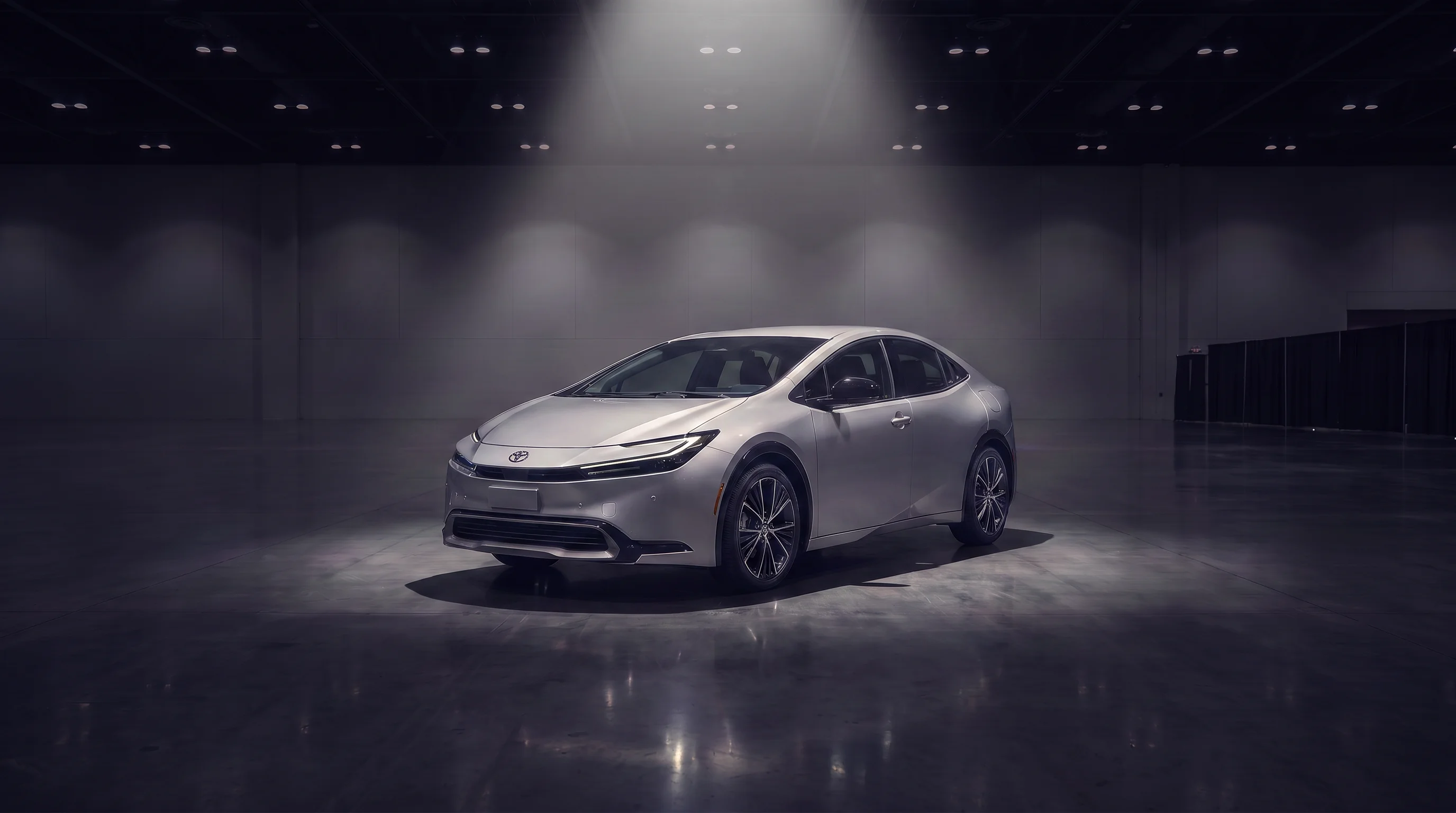 2027 Toyota Prius Plug-in Hybrid hatchback shown in profile, available at Toyota of Glendale