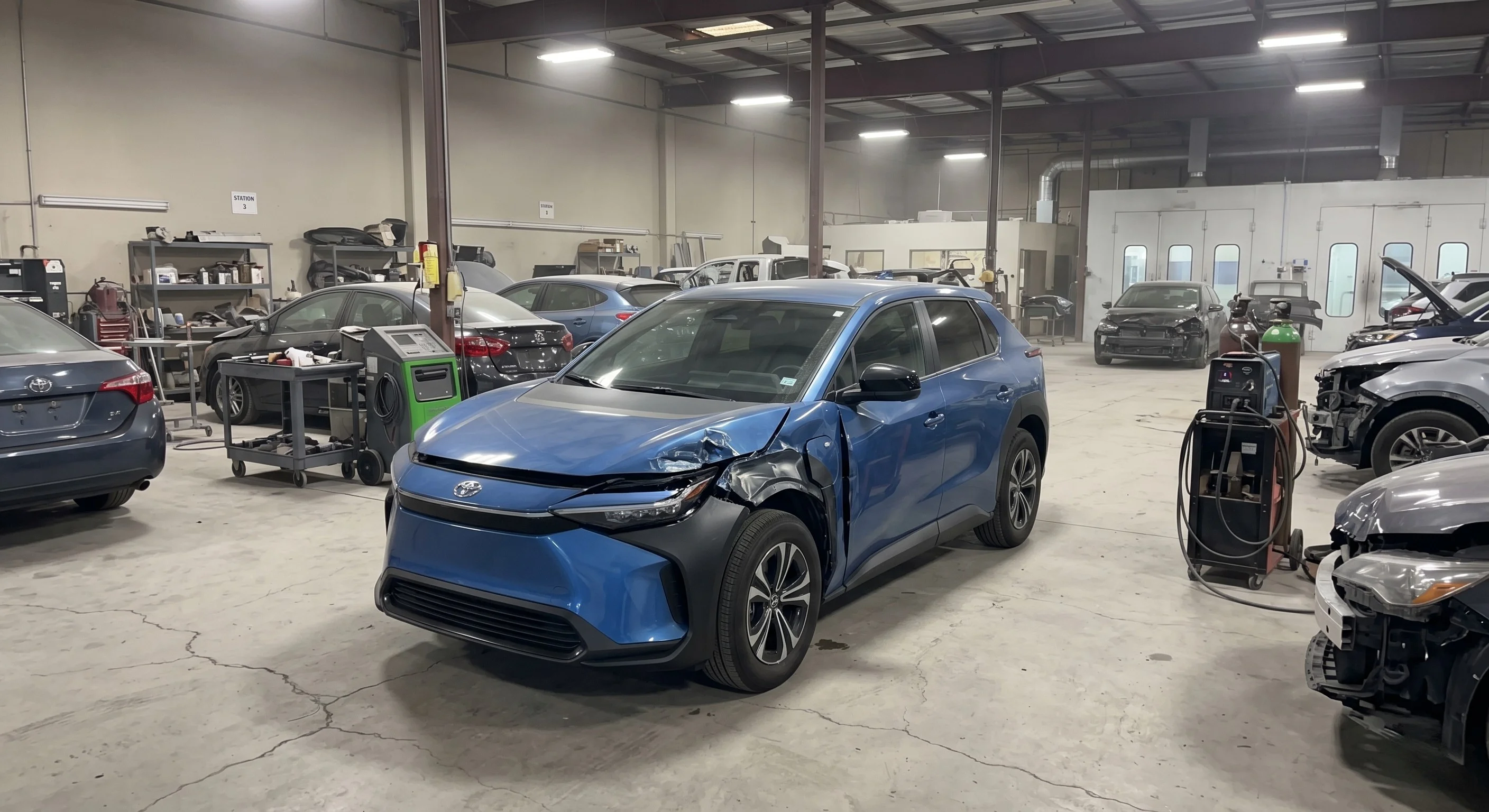 Technician performing certified EV and hybrid collision repair at North Hollywood Toyota