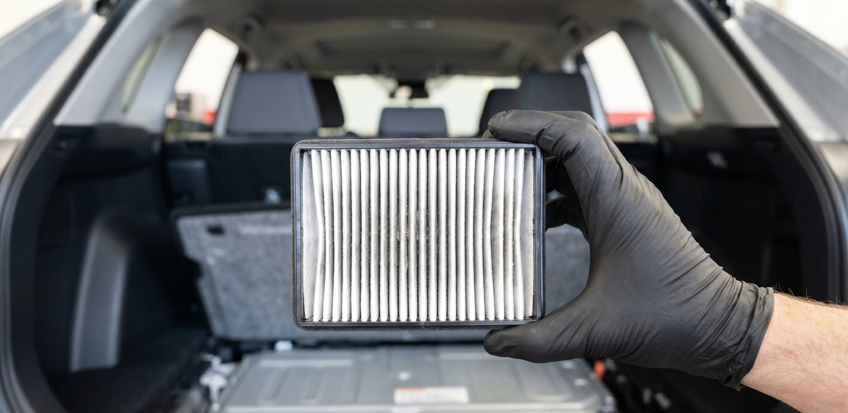 Toyota hybrid battery air filter inspection at Tustin Toyota service center