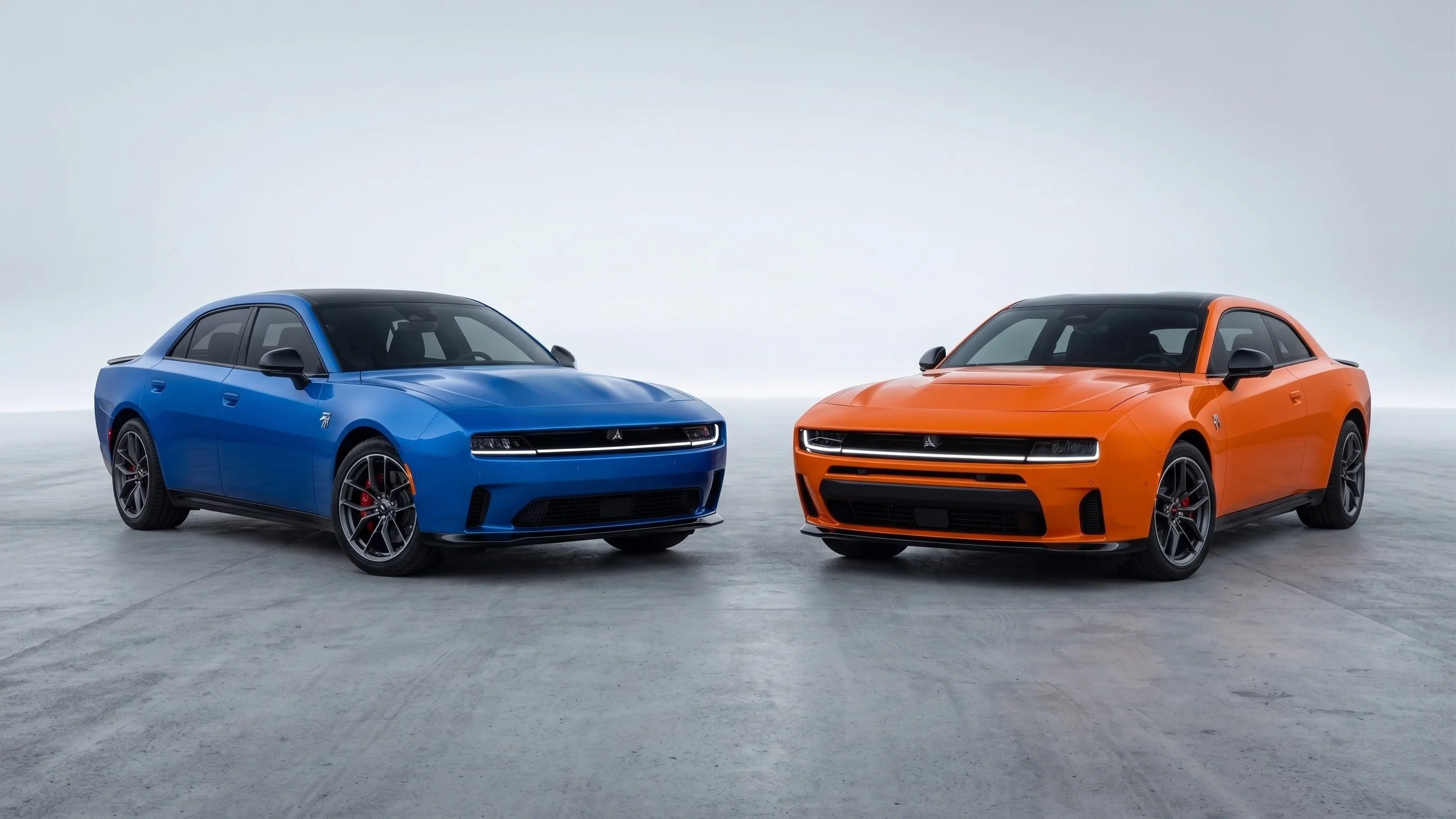 2026 Dodge Charger Sixpack gas model and all-electric Daytona shown side by side